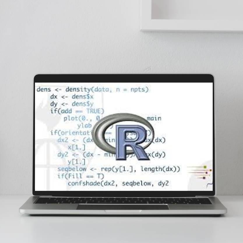 A laptop with a R and equations on the screen